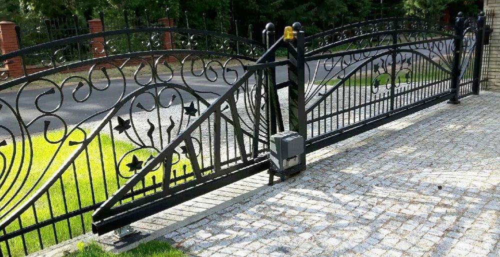 Ogrodzenia kute brama skrzydłowa bramy wjazdowe metalowe kowalstwo