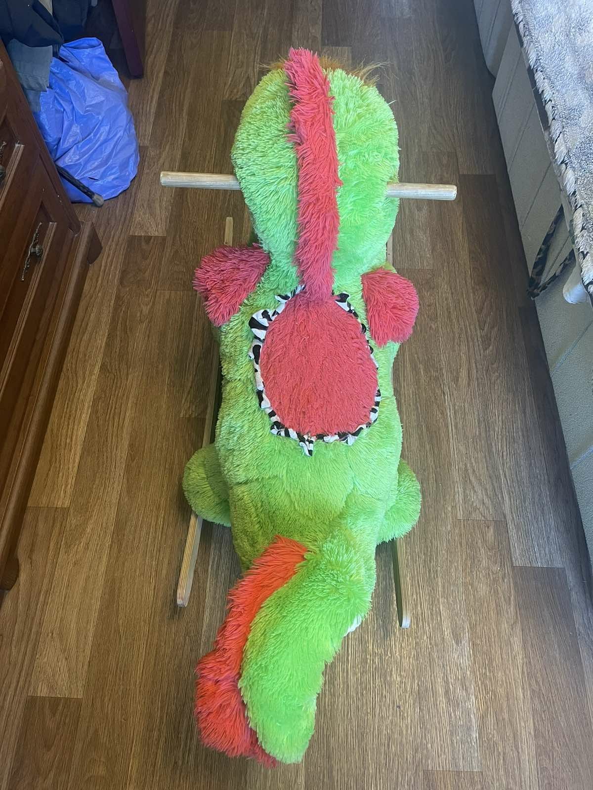 Детская игрушка качалка динозавр