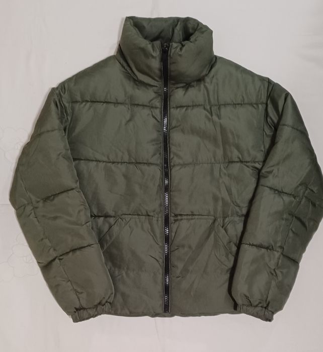 Женский пуховик  Peacocks