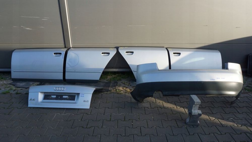 DRZWI LEWE TYŁ SREBRNE AUDI A4 B6 SEDAN LY7W