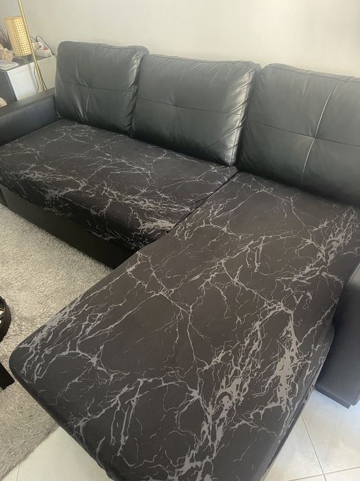 Sofa com chaisse long com arrumacao