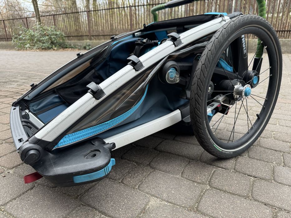 Przyczepa rowerowa thule cross 2 z zestawem biegowym oraz 1 śpiworem