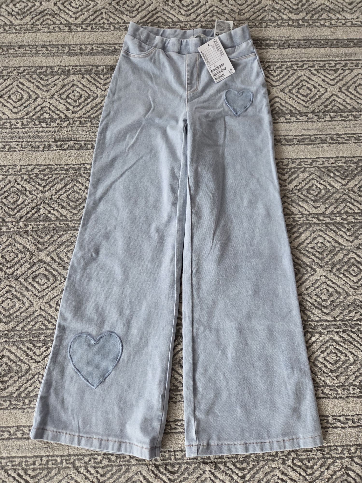 Nowe legginsy szerokie H&M 134