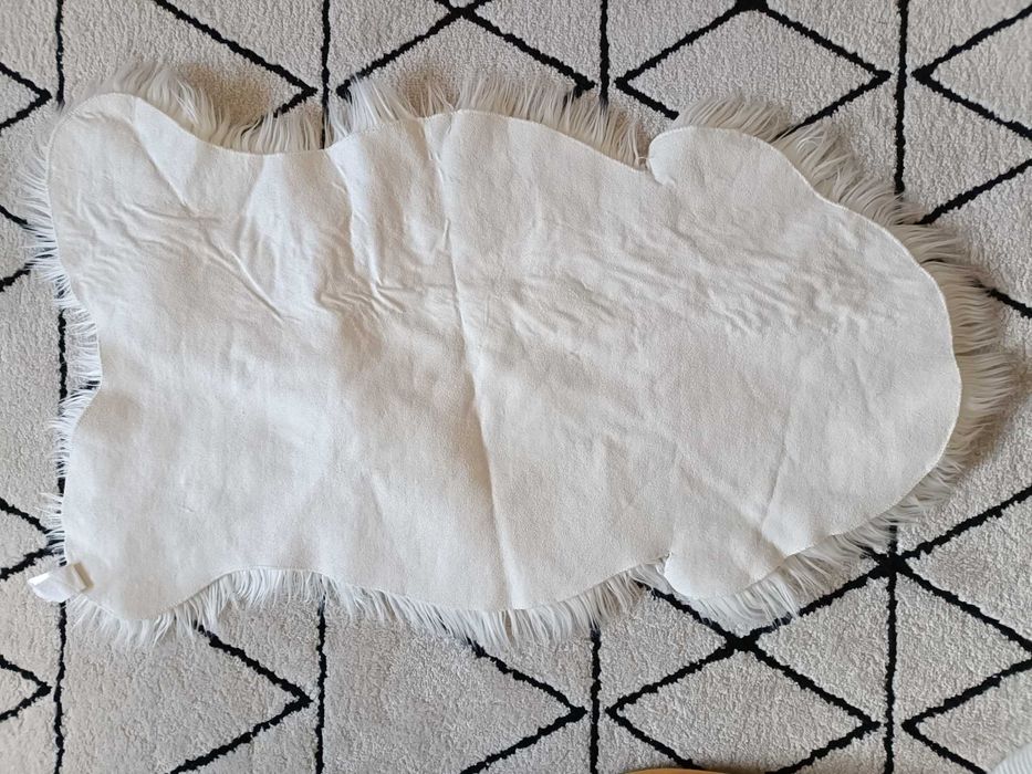 Tapete em imitação pelo