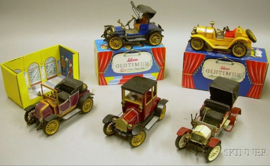 Six Schuco "Old Timer" Clockwork Automobiles