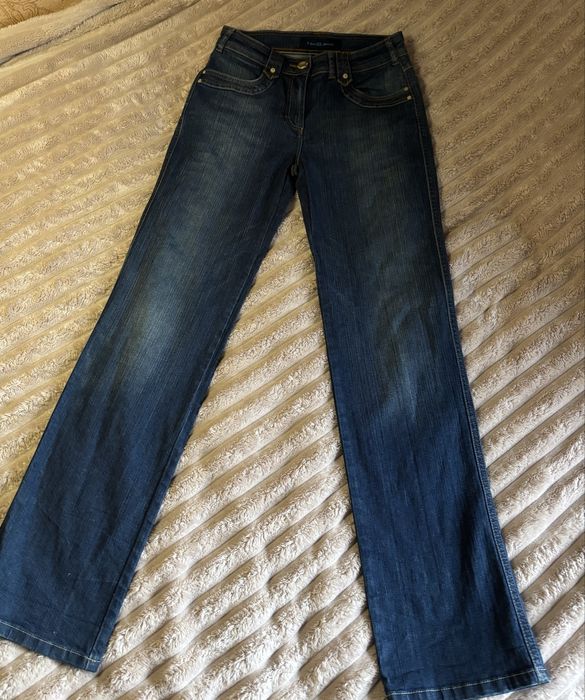 Вінтажні Джинси кльош з низ. посадкою розмір с