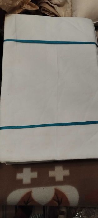 Peça de pano para lençol.