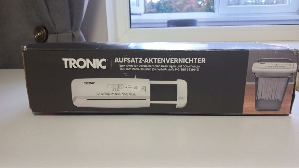Шредер, подрібнювач паперу Tronic Aufsatz-Aktenvernichter.