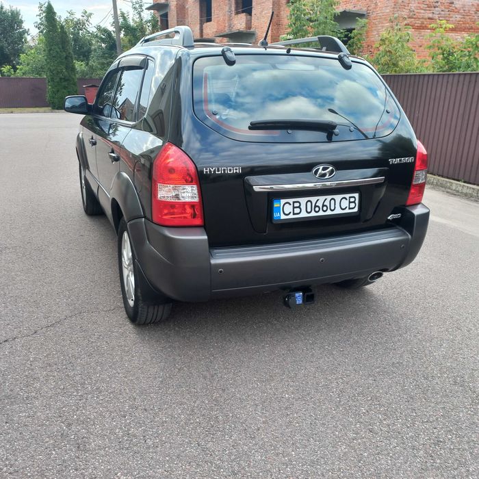 Hyundai Tucson, I покоління  2.0 DOHC МТ (142 к.с.) 4WD  Base