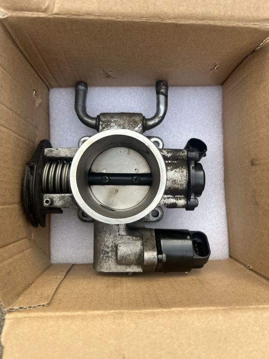 Дросельна заслонка lanos aveo nexia