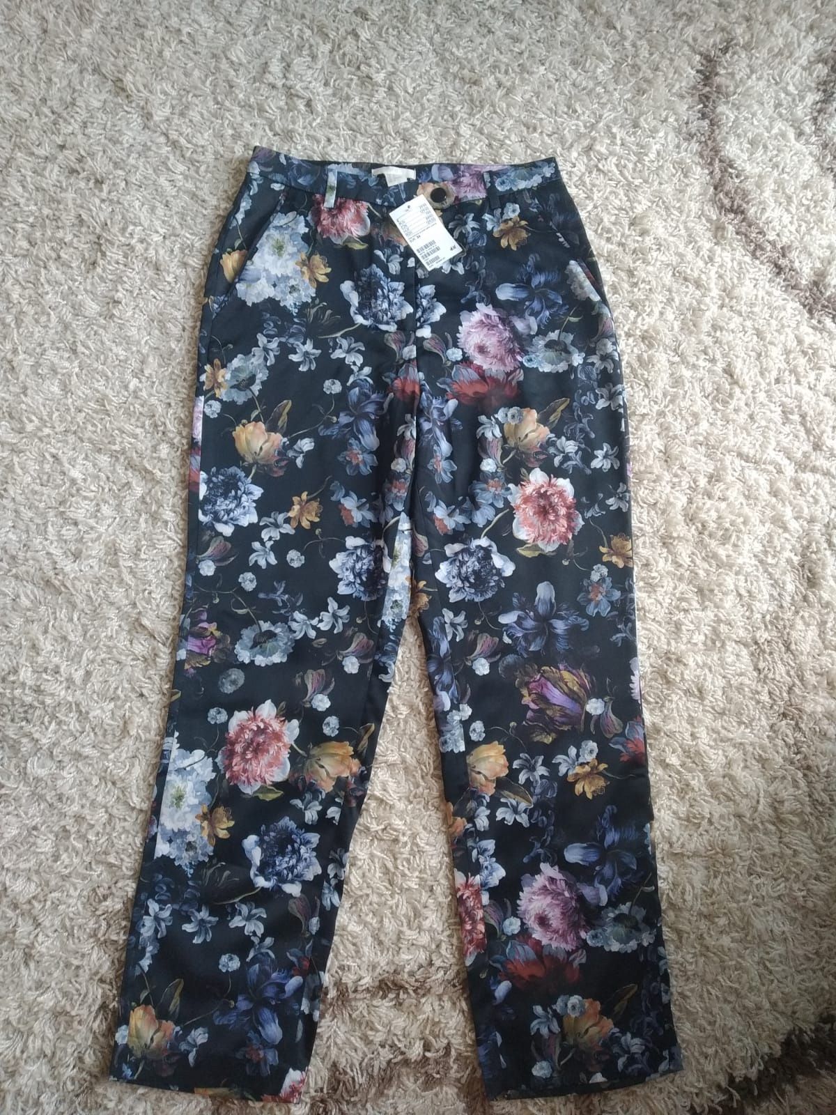 Nowe spodnie w kwiaty rozmiar 36 H&M