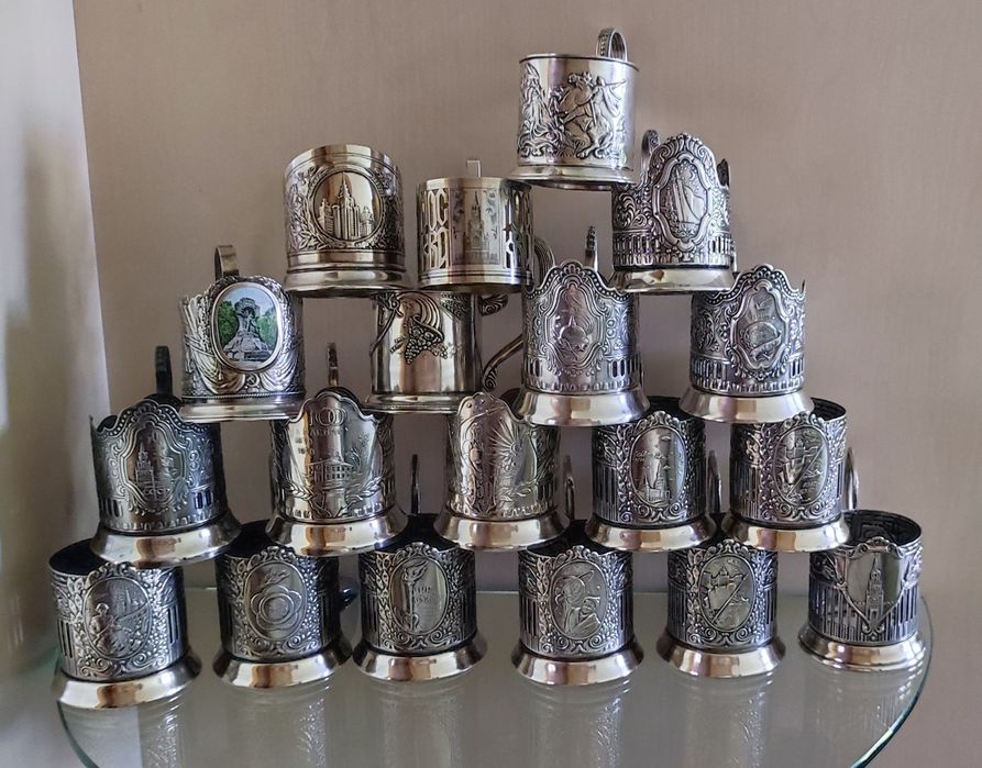 Чашка фарфоровая писатели, подстаканники посеребрянные, серебряные.