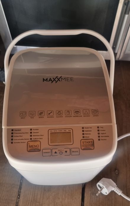 Хлібопічка нова .