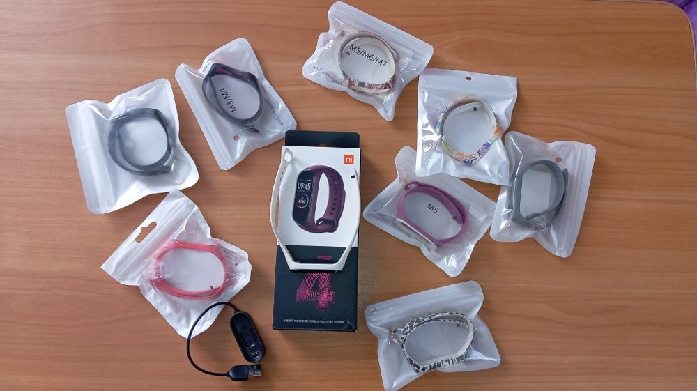 Оригінальний фітнес-трекер Mi Band 4 з браслетами (9шт.)