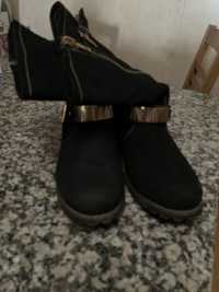 Botas em bom estado