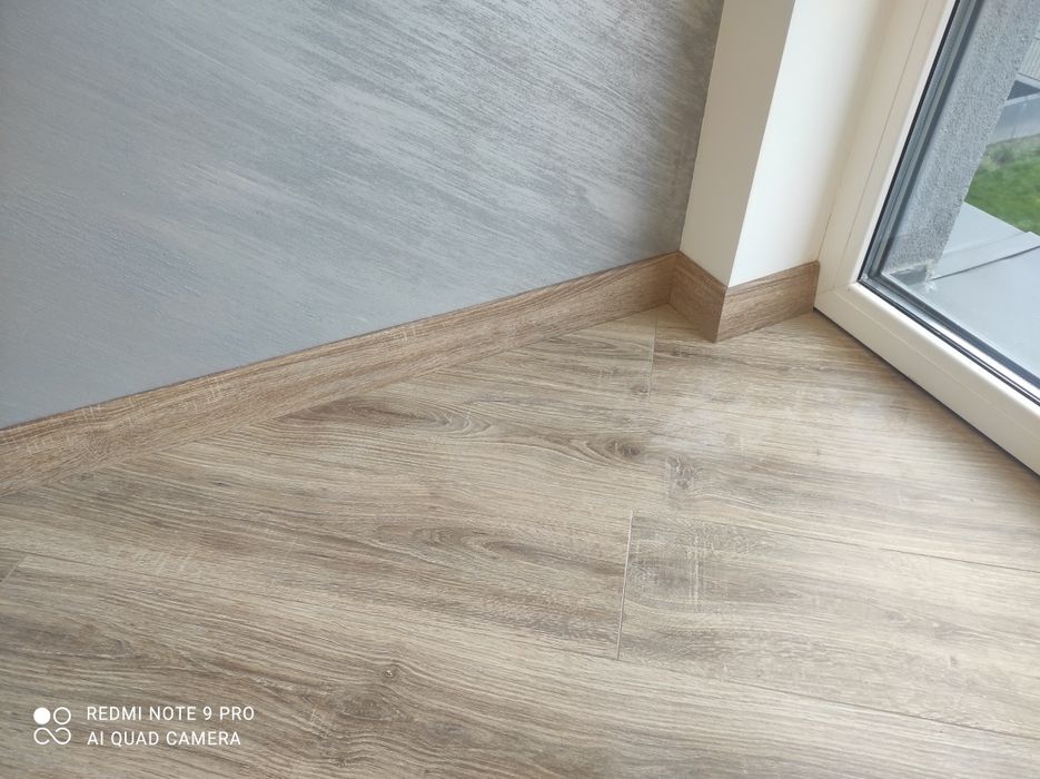 Монтаж плінтуса та ламінату Львів !  Укладка  ламінату МДФ
