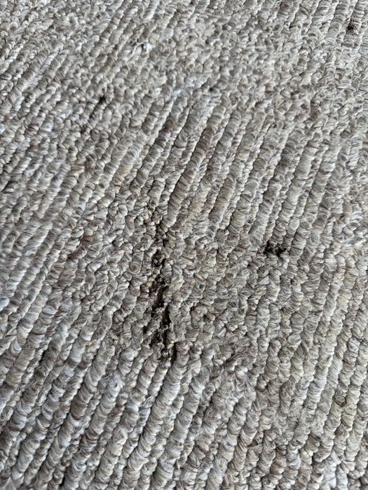 палас, коврик з дефектом