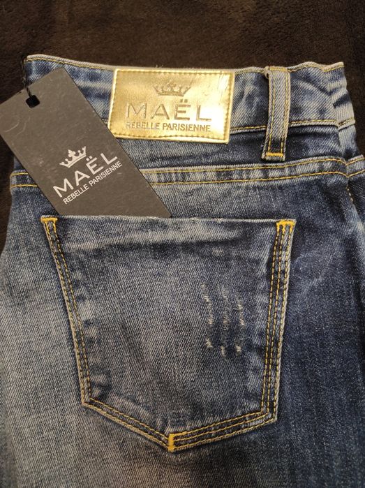 Нові класичні сині джинси розмір М