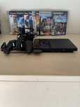Playstation 2 com 9 jogos e pouco uso