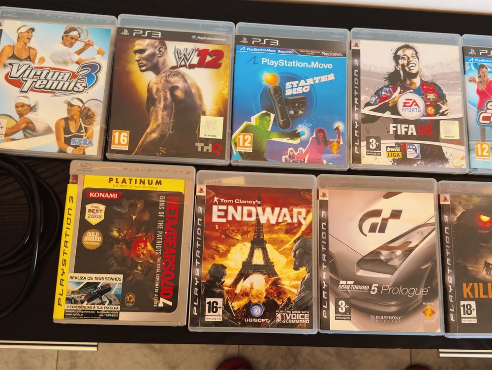 PlayStation 3 + 2 comandos + 15 jogos ( com leitor para reparacão)