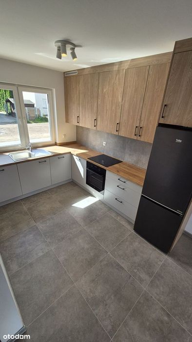 Dom z 4 pokojami 91m²  i  ogródkiem