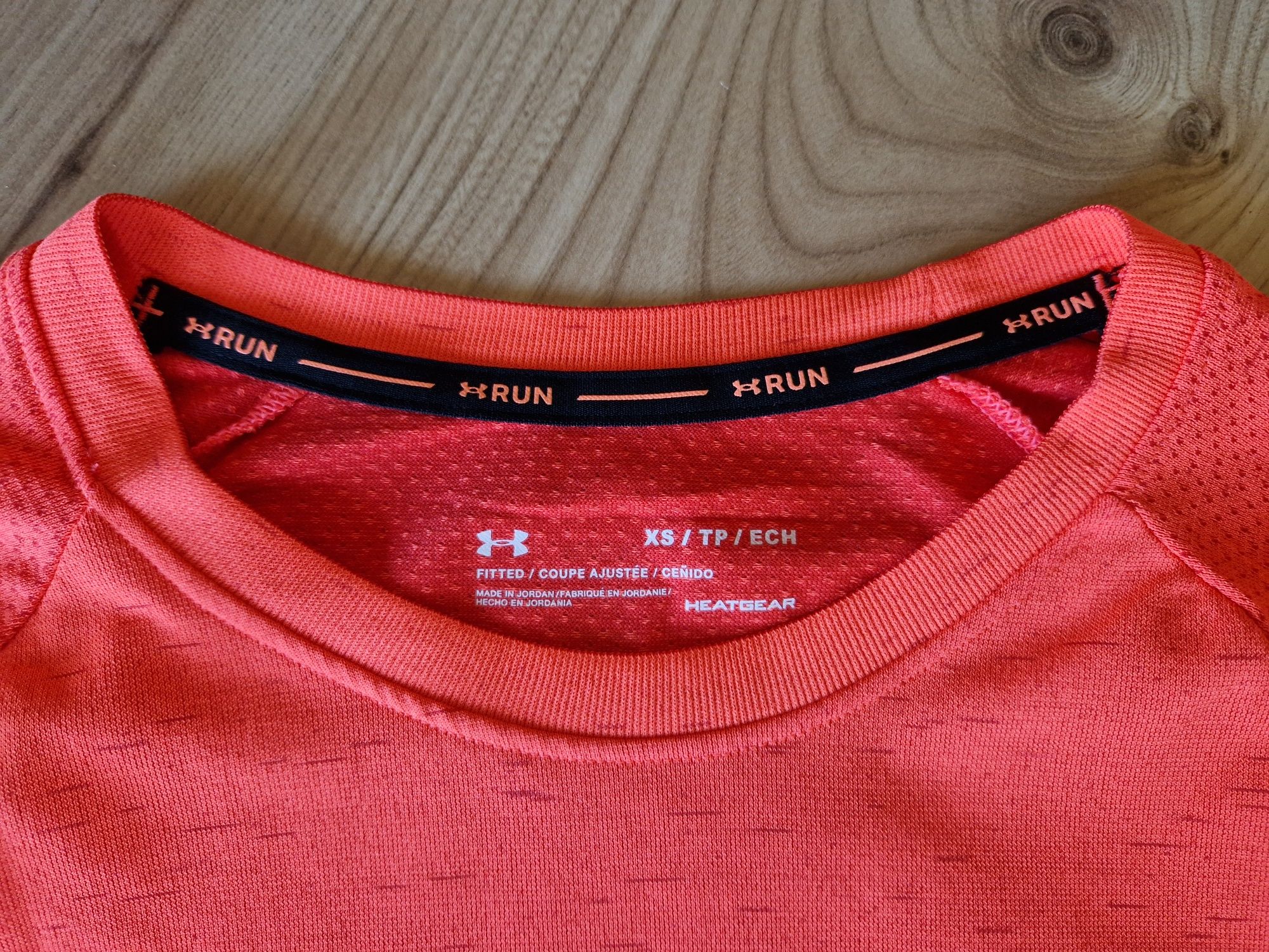 Under Armour UA biegowa koszulka damska Seamless Run XS