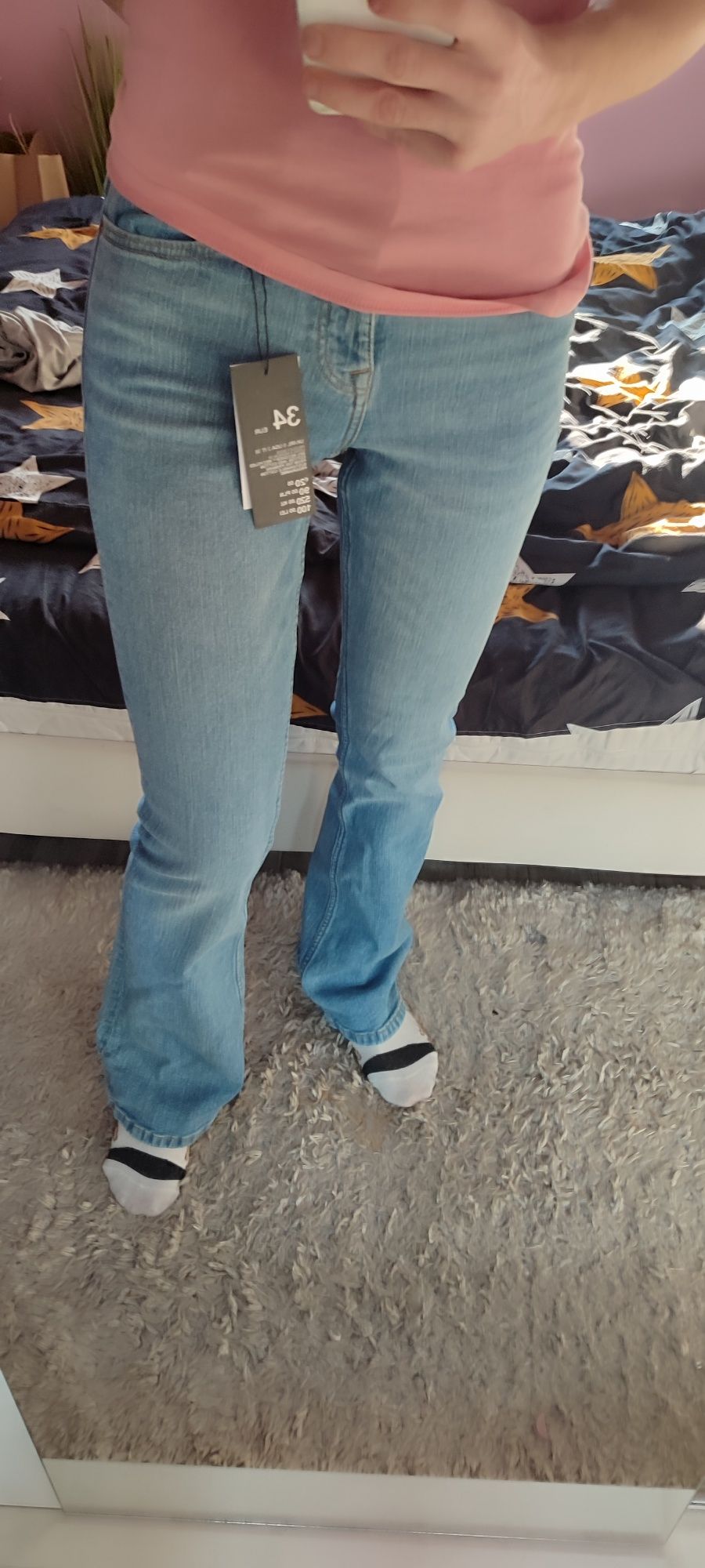 Nowe jeansy flare szerokie nogawki