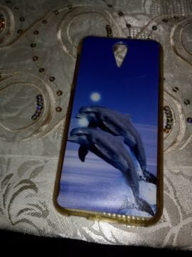 Etui na telefon z delfinkami