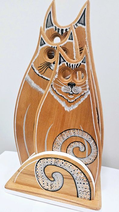 Na prezent koty na deskach