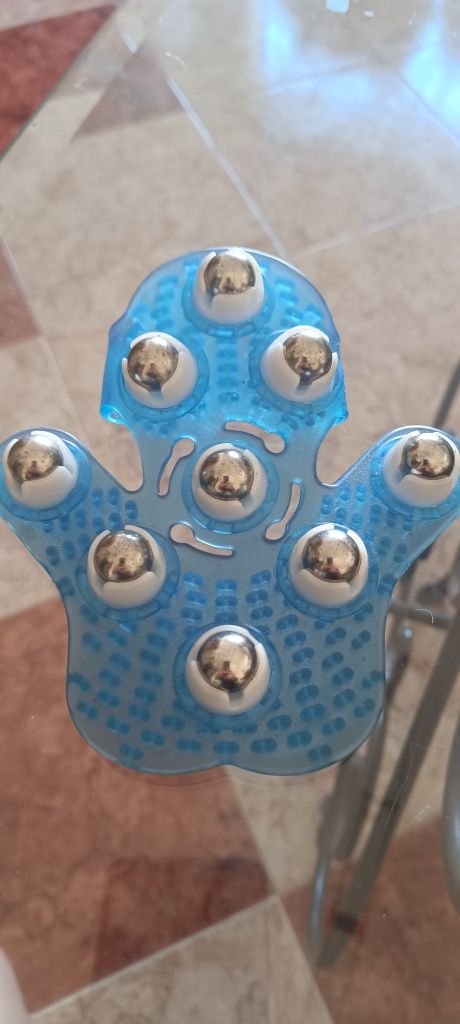 Luva de massagem com esferas