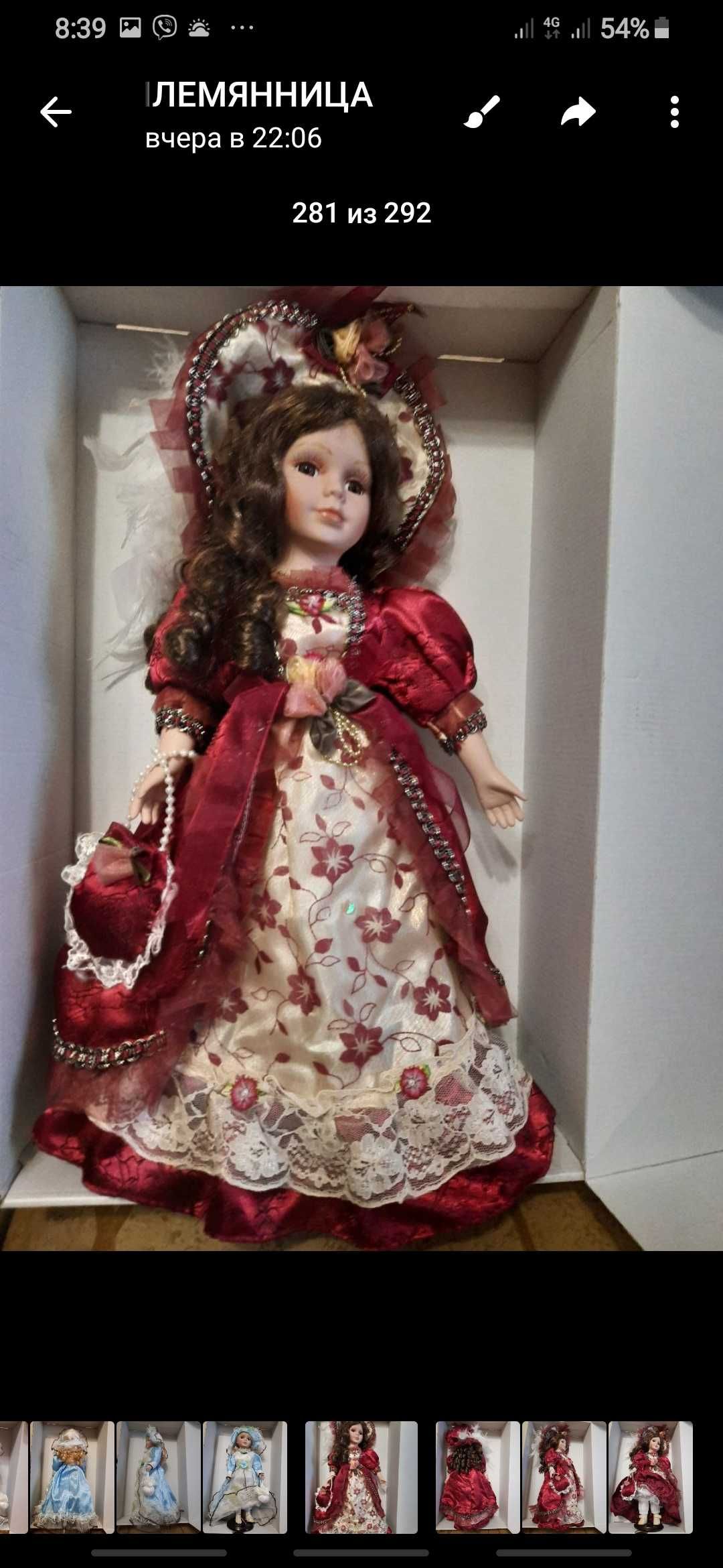 Большая красивая кукла в хорошем платье