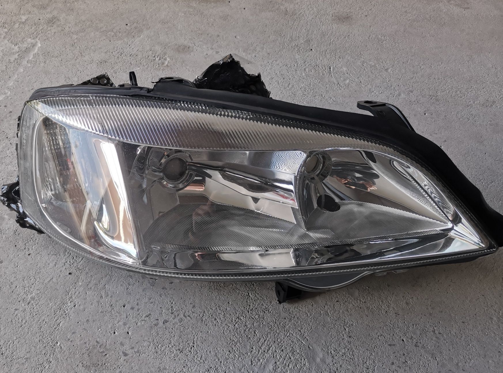 Lampy przód Opel Astra G