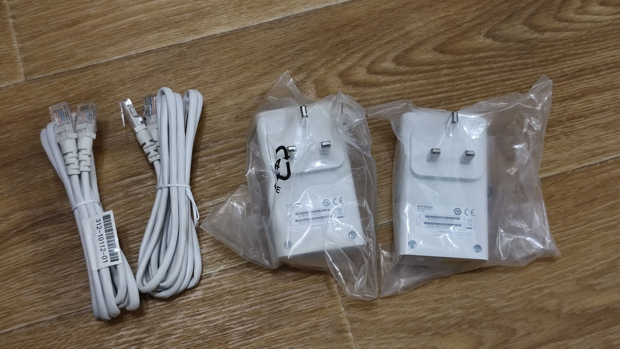 Сетевые адаптеры, Powerline-адаптер Netgear PL1000