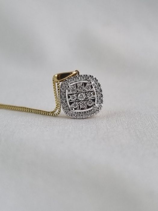 Złota zawieszka z diamentami Au.585 0,13ct wisiorek z brylantami