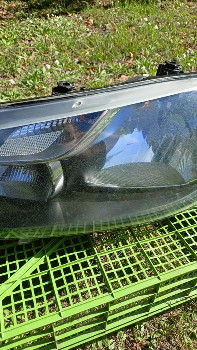 Фара Caddy 3 ОРИГІНАЛ (ліва)