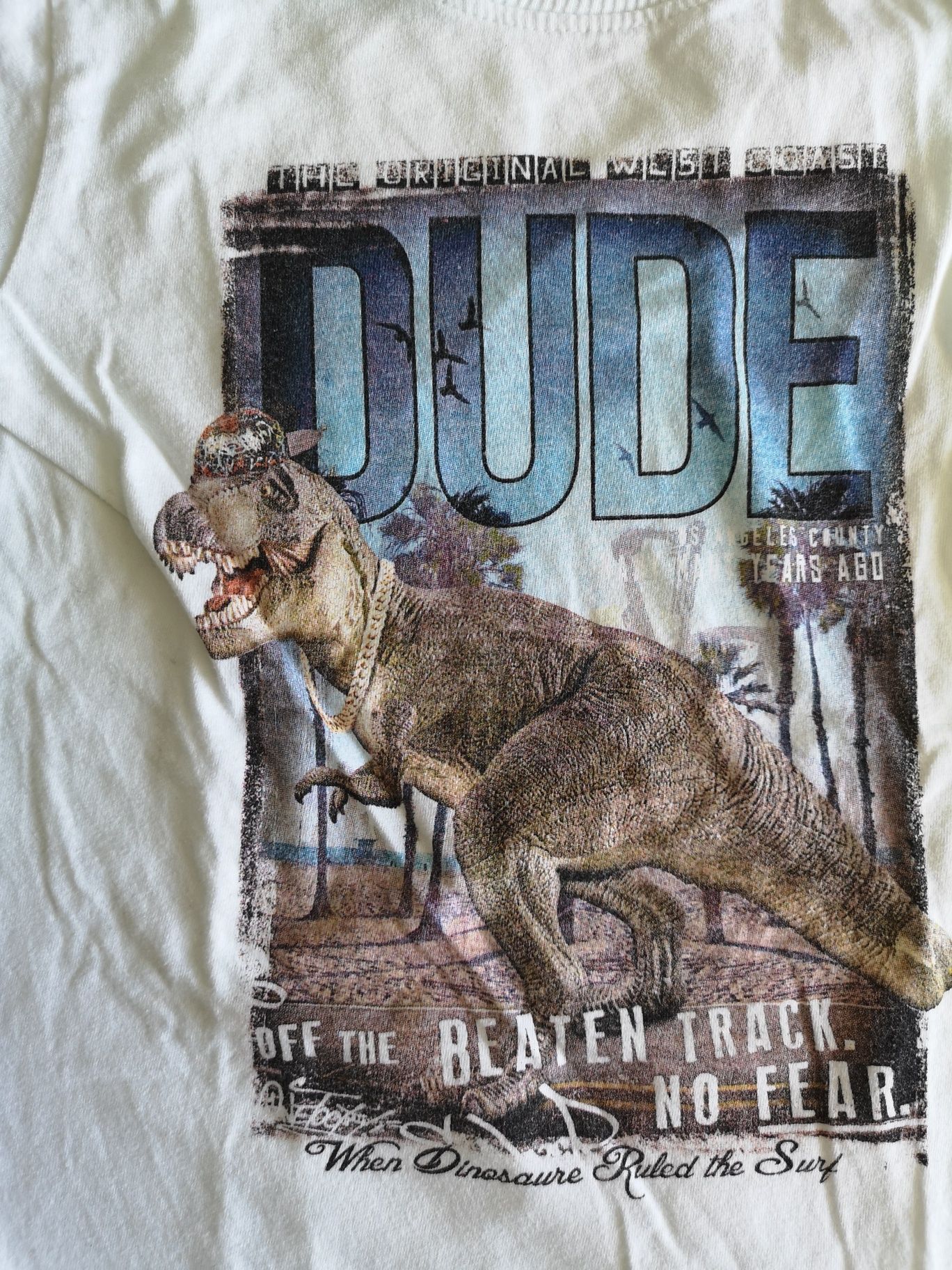 Biała koszulka z dinozaurem 116