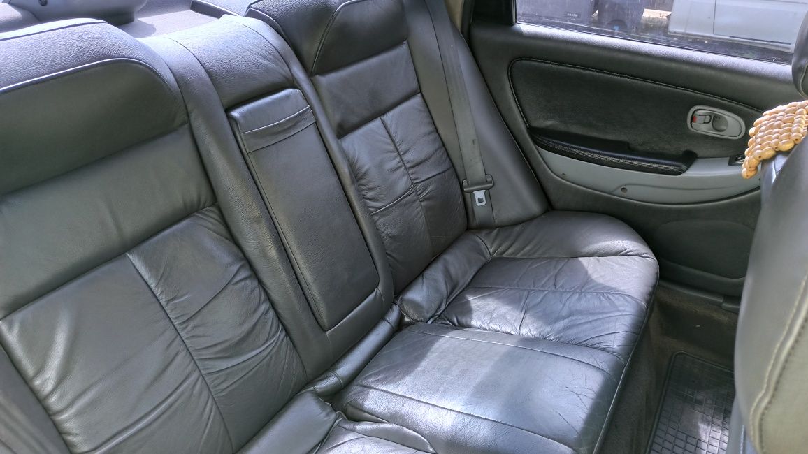 Автомобиль киа кларус