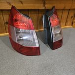 Задні ліхтарі стопи Renault Scenic 2 8200127702  8200127704