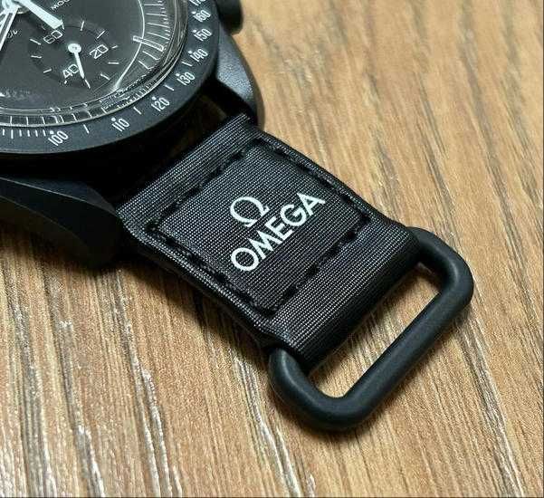Ekskluzywny SO33B700 Omega x Swatch Snoopy：Czarna Faza Księżyca