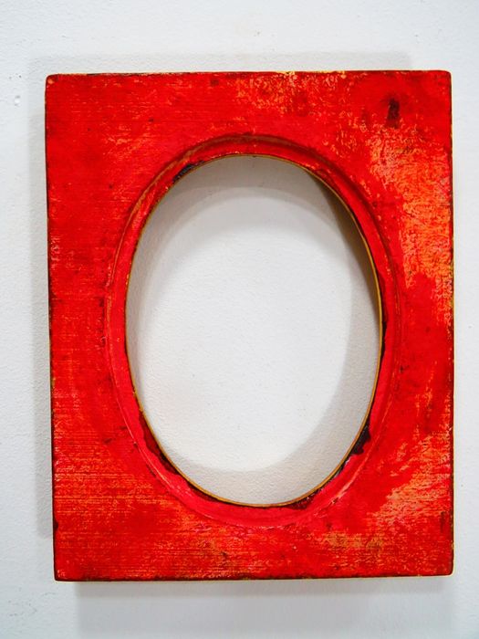 Moldura em talha dourada.