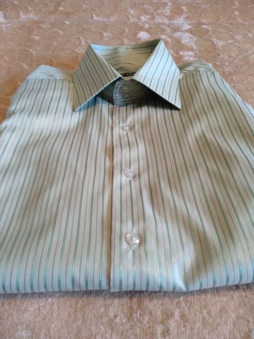 Продам новую  рубашку