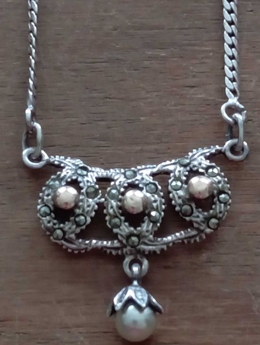 Colar em ouro e prata devidamente contrastado