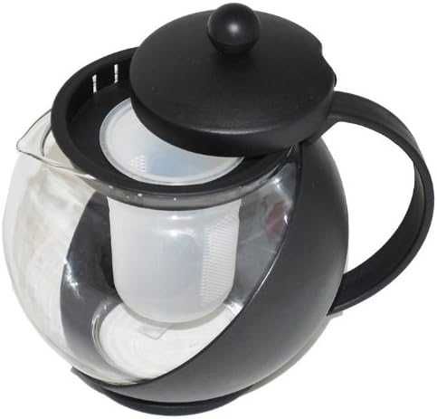 Czarny szklany dzbanek do herbaty z zaparzaczem współczesna kuchnia