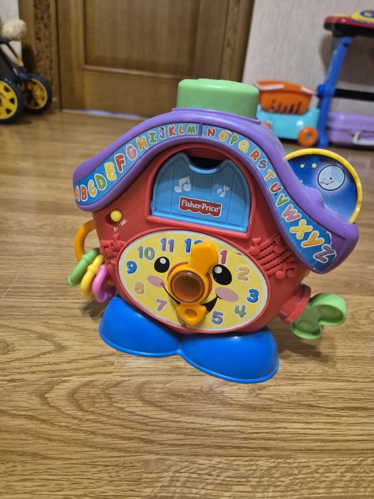 Іграшка годинник розвиваюча