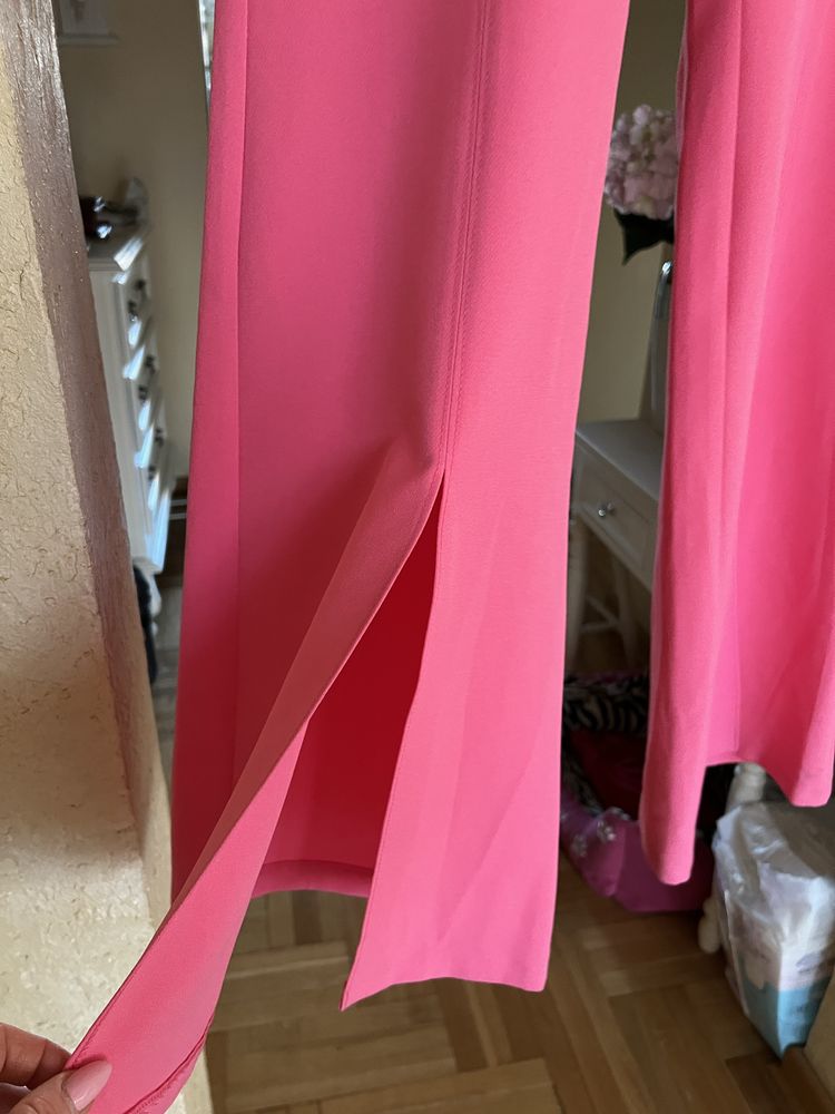 Spodnie dzwony różowe z rozcięciem na nogawce XL-2XL