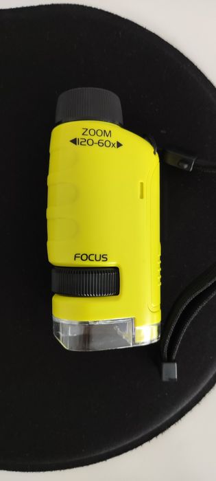 Microscópio de bolso novo