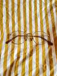 Złote okulary korekcyjne retro – okrągłe oprawki vintage unisex
