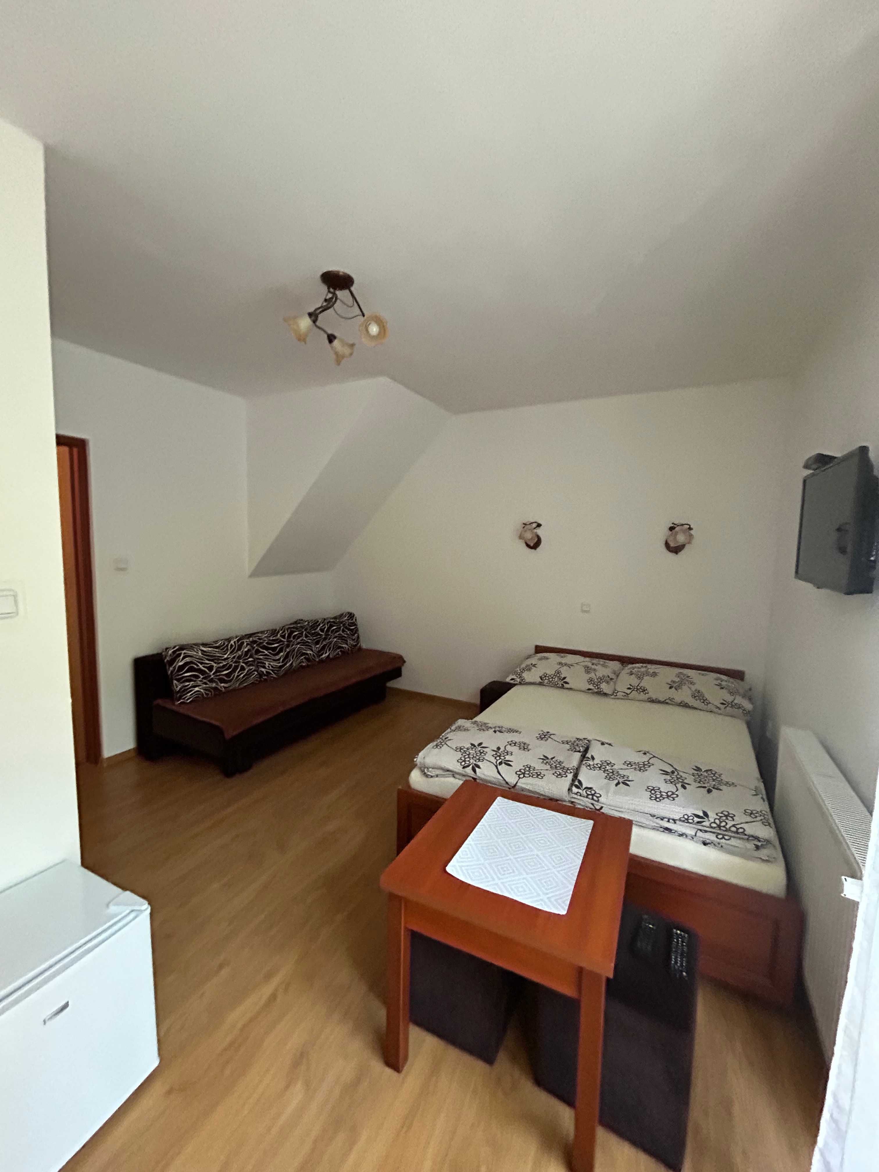 Pokoje Gościnne POD LASEM Pogorzelica