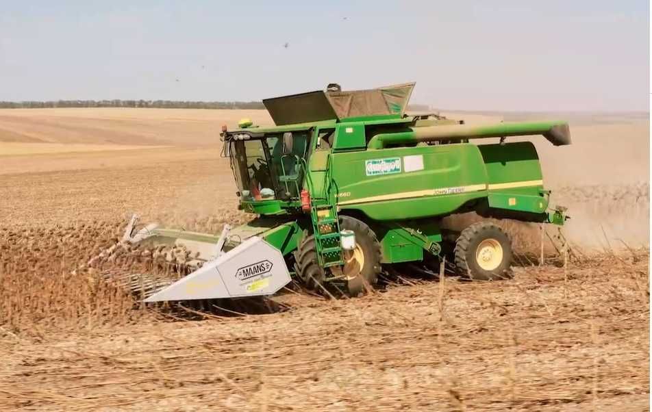 Жатка соняшникова Maans S під Клаас, Нью Холланд (Claas, New Holland).