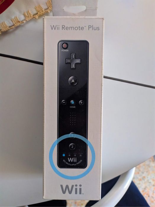 Nintendo Wii com 2 comandos + 4 jogos (Wii sports, Wii Sports Resort…)